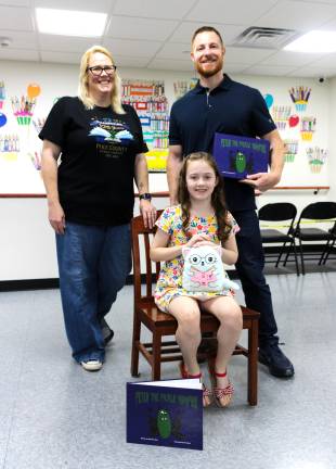 Program Coordinator Sabrina Llewellyn with Nicholas Niosi and Ava Niosi.