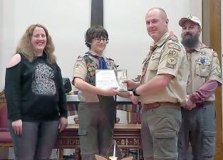 Pictured from left to right at the awards ceremony held at the Evangelical Presbyterian Church in Milford are: Lisa Dognazzi, Scout James Dognazzi Jr., Troop 1071 Scoutmaster John Llewellyn and James Dognazzi Sr. Photo provided by John Llewellyn.