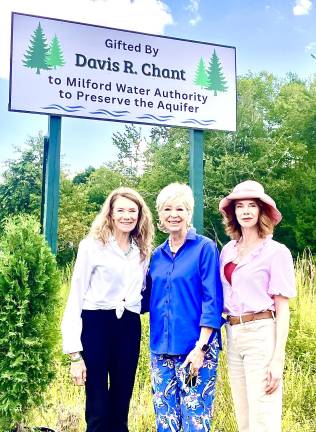 Pictured from left in front of the newly erected sign acknowledging the property donation are Tamara Chant, Judy Chant and Holley Chant.