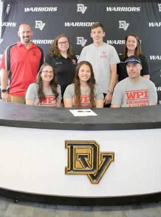 Pictured (left to right: front row) – Mrs. Grace Corcoran, senior Victoria Corcoran and Mr. Ryan Corcoran. (left to right: back row) – Club coach Kenny Kleso, head swimming coach Chelsea Shatt, brother Alex Corcoran and assistant coach Erica Muttee