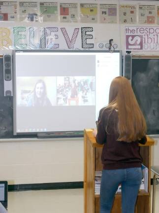 DV graduate talks to journalism class about working the beat