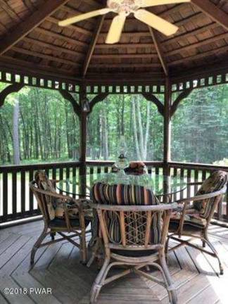 Enjoy woods and water in this two-story country farmhouse