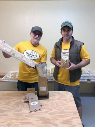 David and Granger Greenbaum prepare to package a new batch of Noodlers Handmade Pasta.