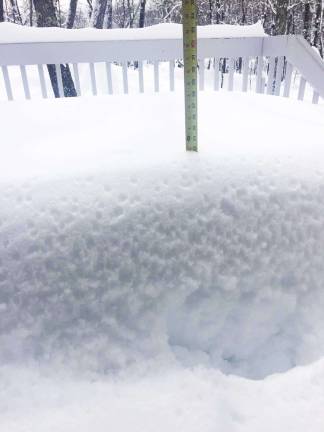 This ruler shows 23 inches of snow fell on a porch at Sunrise Lakes (Photo by Nina Verissimo)