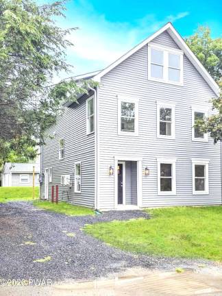 Just built, spacious and move-in ready with three-plus bedrooms
