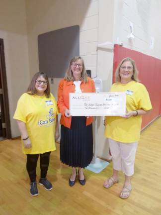 PASS Administrative Assistant Wendy Ryan, All One Charities and Foundation Program Officer Mary Carroll Donahue, PASS Executive Director Jeannemarie Passaro
