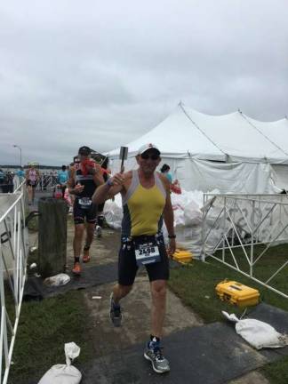 Joe Legg heads out on the run portion (Photo providec)