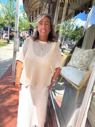 Laura Staine, president of Milford Presents, outside her store Willow