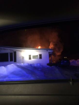 The burning house on Avenue O (Photo provided)