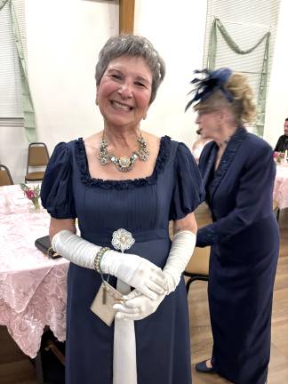 Ball attendee Maria Cirillo-Lein took the request to dress “Bridgerton style” seriously, right up to the wearing a traditional dance card.