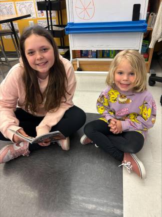 Chloe Flood and Emilia Hudson