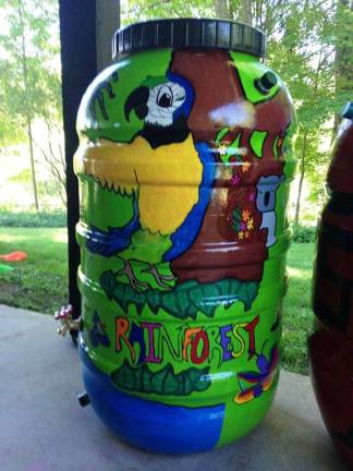 This barrel is adorned with scenes from the rainforest ( (Delaware Conservancy Facebook photo)