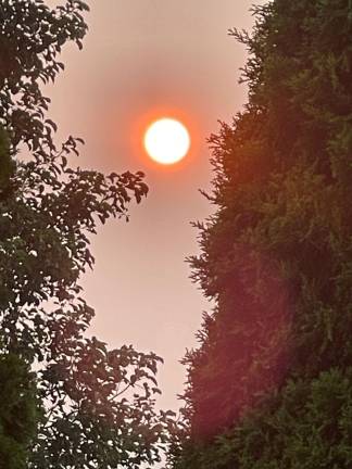 A hazy orange sky in Matamoras. Photo: Carol Losee