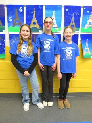 L-R: Macy Ellis, Norah Jaludi, Elyse Behnke performed at the PMEA District 10 Elementary Band and Orchestra Fest .
