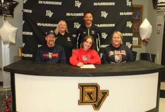 <b>From left, front row: Michael Holderith, senior Noelle Holderith and Rebecca Holderith, back row: Head tennis coach Amy Strickler and previous coach Kevin Quinn</b>