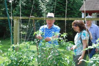 Klaas Vogel showing his garden at the 2019 Kitchen Garden Tour. The longtime gardener will invite locals to check out his crops again at this year’s event Aug. 13. File photo.