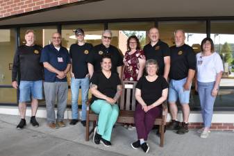 From left: Mike Kinzinger, WMH CEO Jim Pettinato, Connor Buchinski, Dennis Buchinski Sr., WMH CFO Patty Dunsinger, Doug Buchinski, Dennis Buchinski Jr., WMH Chief Nursing and Patient Care Officer Chandra Roberts. Seated on the bench are Kim Rodney and Debbie Harsch.
