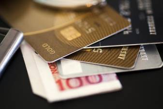 According to a WalletHub Study, Pennsylvania ranks fourth among the states with the lowest credit card debts. Photo illustration by wundelman vis freeimages.com.
