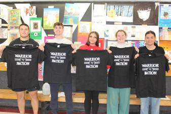Some of DVHS Students of the Month showing off their Warrior Nation t-shirts.