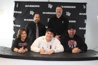 L-R Front: Karen Black, Aiden Black, and Rob Black. L-R Back: Head wrestling coach Lou DeLauro and head football coach Keith Olsommer.