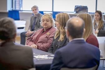 Participants in an experimental intergenerational program at Penn State met with state officials.