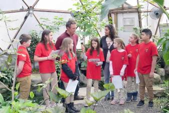 From left: Drew Wallace, Makaylee Kalitsnik, Kiera Mulzet, Mr. Comstock, Daisy Burnett, Ms. Gupta, Juliet Lee, Alexandra Morton, Daeton Vazquez