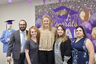 First graduates of medical assistant program. Shown left to right, Ebi Rowshanshad, DO, family practitioner, Hamlin Family Health Center; Kristen Knash, CMA, Highland Physicians Family Health Center and WMCHC site facilitator for NIMAA; Julia Pizzo, WMCHC’s first NIMAA graduate; Victoria Purdy, Human Resources, WMCHC and program coordinator for NIMAA; Maria Emiliani, CMA, Hamlin Family Health Center and preceptor for NIMAA.