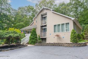 Custom three-bedroom home offers a private, serene setting