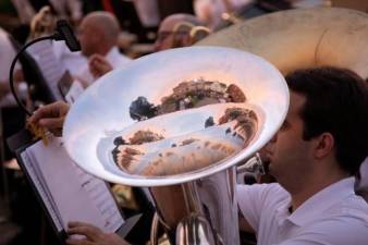 Photographer Robert G. Breese’s photo of Warwick’s iconic downtown buildings reflected in a tuba during a concert at Railroad Green earned second place in the ultra-competitive “Best Feature Photo” category.