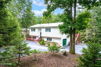 Walk down to your boat dock from this lakefront bi-level