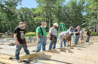 Volunteers with Habitat for Humanity of Pike County work to put up a wall (Photo provided)