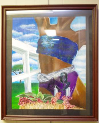 Delaware Valley High School senior Amber Doherty painted this framed acrylic called &quot;Strong Woman.&quot; she plans to study art and illustration at the School of Visual Arts in New York City. (Photo by George Leroy Hunter)