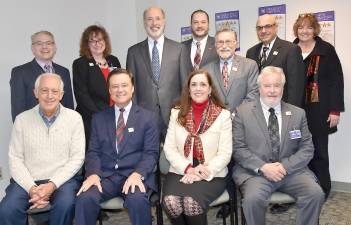 Pictured seated (from left): William Dewar III, MD, Wayne Memorial Chief of Staff; CEO David Hoff; PA Senator Lisa Baker (R-20); Wayne Memorial Community Health Centers Executive Director Fred Jackson. Standing: James Cruse MD; Patricia Dunsinger, Wayne Memorial CFO; Governor Tom Wolf; PA Rep. Jonathan Fritz (R-111); Hospital &amp; Health System Board Chair Hugh Rechner; Wayne Memorial Director Patient Care Services Jim Pettinato; Mary Beth Wood, executive director, Wayne Economic Development Corporation.