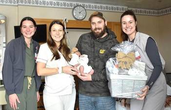 From left: Megan Bidwell, RN, Carroll Tice, baby Adaline, Jordan Tice, and Nikita Pezzi, RN.