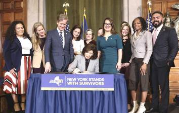 Governor Kathy Hochul signs a bill expanding the definition of rape.