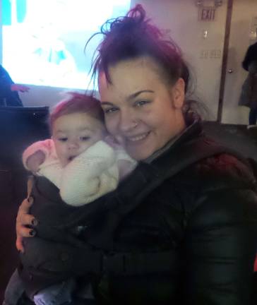 Jessica Fortna holds daughter Anastazija (Photo by Frances Ruth Harris)