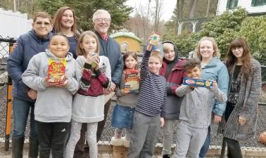 Pictured in the back row (from left): Mary Coene, Mary Rebe, Green Trees director; county commissioner Matt Osterberg; Trevor Mussolini; and Cera Alber, program director; front: Gianni Davis, Elizabeth Hopper, Lyla Sustak, Jaylen Davis, and Jeff Foord