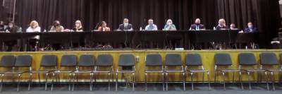 The school board at its Sept. 28 meeting, from left: Ashley Zimmerman, solicitor; Dawn Bukaj; Felicia Sheehan; Pat Lutfy; Jessica Decker, vice-president; Jack Fisher, president; Corey Homer; Rosemary Walsh; Dr. John Bell, superintendent; Julie Ewald, recording secretary. (Photo by Frances Ruth Harris)