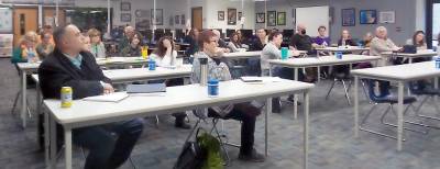 Approximately 50 people attended the curriculum committee meeting in the media center on March 17. (Photo by Frances Ruth Harris)