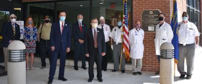 Back row, left to right: Dirk Mumford, former Wayne Memorial Hospital (WMH) Board Chair; Joann Hudak, vice-chair WMH Board and chair WMH Centennial Committee; Larry Zeller, retired WMH respiratory therapist &amp; U.S. veteran; William Dewar III, MD, WMH Chief of Staff; Phil Sheehan, commander VFW Post 531; James Bruck, American Legion Post 254; Louis D’Oro, MD, WMH Medical Staff President &amp; U.S. veteran; Sean McVeigh, MD, WMH pulmonologist &amp; U.S. veteran; James Carbone, American Legion Post 254. Front: WMH CEO David Hoff &amp; WMH Board Chair Hugh Rechner, U.S. veteran.