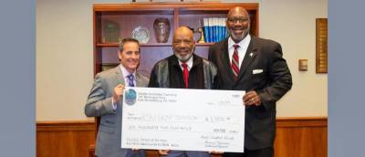 (From left) ESU Foundation Executive Director Rich Santoro, Wayne Bolt, and ESU President Kenneth Long, as Bolt presents the donation from Middle Smithfield Township to the ESU Foundation on March 14, 2023.