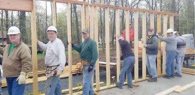 Habitat for Humanity volunteers build a home