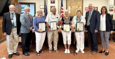 At the July 19th Commissioners Meeting, Board of Elections Director Nadeen Manzoni and Elections Chief Registrar Char Scheuermann welcomed eight individuals into the Voter Hall of Fame. To be inducted, a voter must have voted in a minimum of 50 consecutive elections. Picttured are Commissioners Tony Waldron and Matthew Osterberg; Voter Hall of Fame Inductees Betty Reaggs, Robert Nied, Sandra Smith, Ella Eggenberger; Commissioner Ron Schmalzle; and Elections Director Nadeen Manzoni. Photo provided by the Pike County Board of Elections.