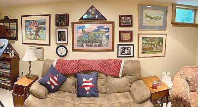 The memorial wall in Kim Pearce‘s basement honoring his father and his brother Jack (Photo provided)