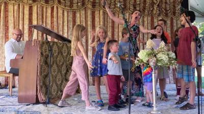 Soprano Emily Margevich singing local children at Opera! Pike! Park! held last Sunday at Ann Street Park in Milford. The singers were accompanied by Jose Melendez at piano. Photos by Marilyn Rosenthal.