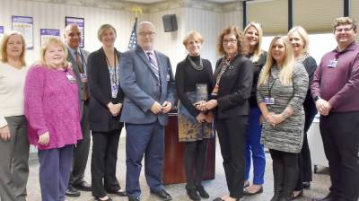 Shown during Community Rural Health Leader Award presentation are, left to right: Carol Kneier, MS, RD, LDN, CDCES, community health manager, Wayne Memorial Hospital; Michelle Corrigan, RN, clinical care coordinator/risk manager, WMCHC; James Pettinato, BSN, MHSA, CCRN-K, chief executive officer, Wayne Memorial Hospital; Kara Poremba, RN practice manager, Women’s Health Center; Robert Fortuner, finance director, WMCHC; Lisa Davis; Norma Nocilla; Wynter Newman, administrator director; WMCHC; Miranda Green, human resource director, WMCHC; Erica Brown, development manager, WMCHC and Kyle Davis.