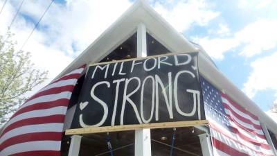 This Milford Strong banner hangs at the Dimmick Inn in Milford. (Photo by Frances Ruth Harris)