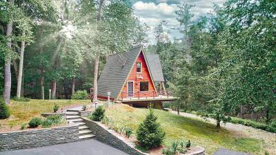 One-of-a-kind retreat on 13+ acres with trout stream