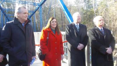 A Senator Lisa Baker at the reopening of the Mott Street Bridge in Milford last January, pictured with Milford Mayor Sean Strub and Pike County Commissioners Ronald Schmalzle and Steve Guccini (Photo by Frances Ruth Harris)