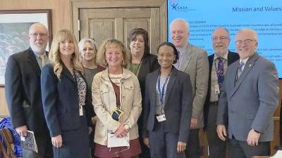 Back row (from left): Steve Gill, Program Specialist of Eastern Region Pennsylvania CASA; Marcia Reese, SAM, Inc.; Dawn Allison, CASA of Pike County Director; and Commissioners Schmalzle, Waldron and Osterberg. Front row: Judge Kelly Gaughan; Nancy Clemens, SAM, Inc.; and Michele Burrell, Children and Youth Services Administrator (Photo provided)